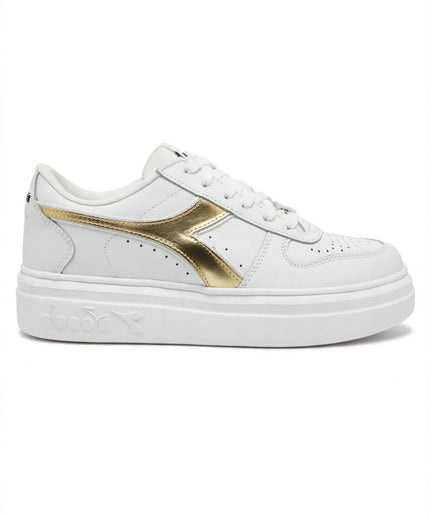 Sneakers Diadora bianche con dettagli dorati
