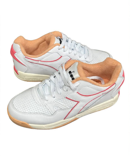 Sneakers Diadora bianche con dettagli rossi