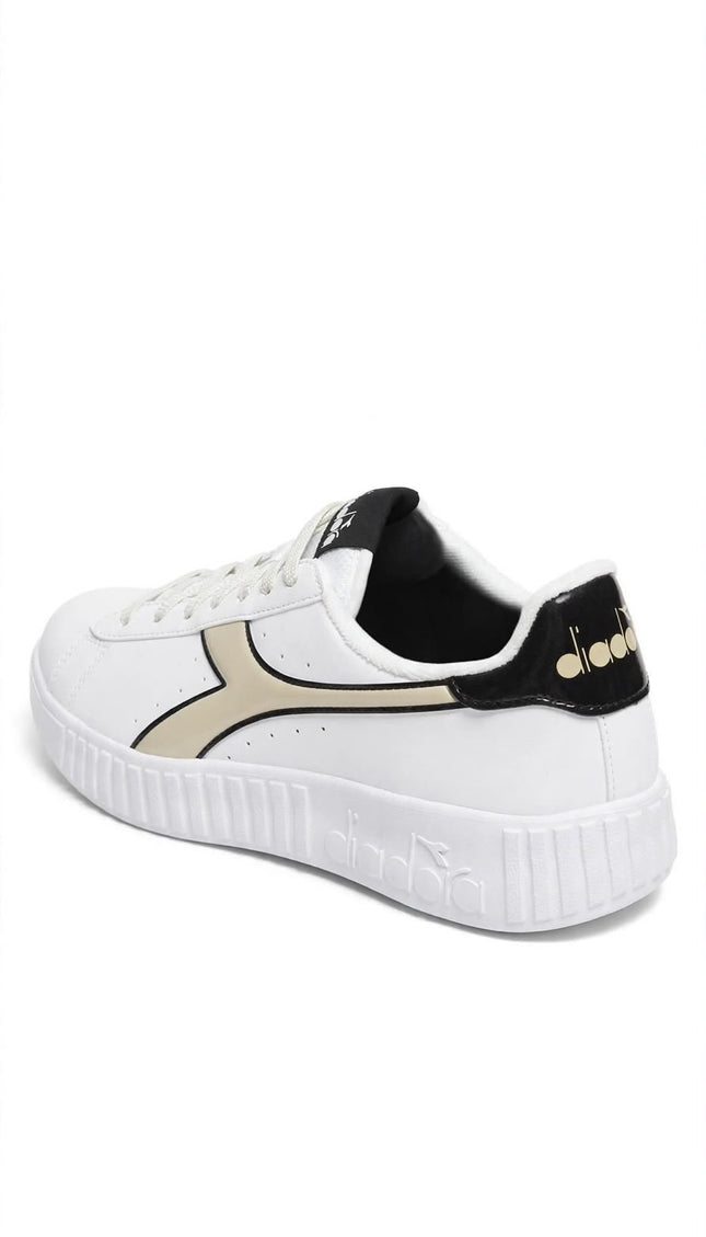 Sneakers Diadora bianche con dettagli beige e neri