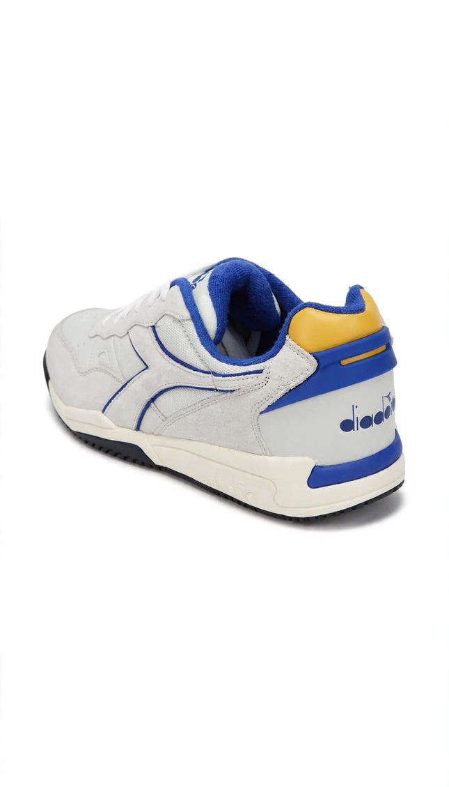 Sneaker Diadora Bianca con Profili Blu e Dettaglio Giallo