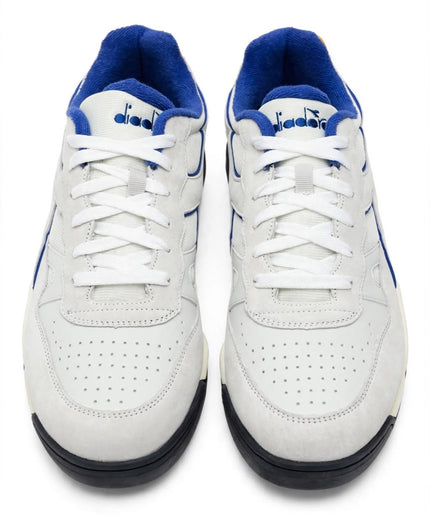 Sneaker Diadora Bianca con Profili Blu e Dettaglio Giallo