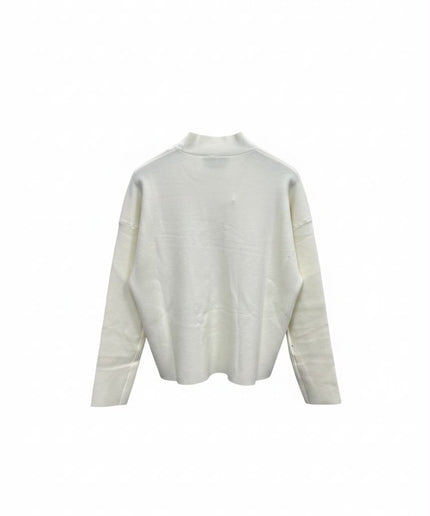 Cristina Effe maglia color panna a collo alto e maniche lunghe