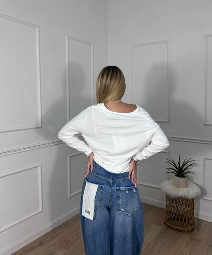 Maglia bianca drappeggiata con scollo asimmetrico Haveone