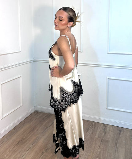 Completo gonna e top avorio con pizzo nero Tensione In